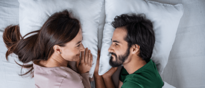Unconscious Cleaning Happy Couple in Bed