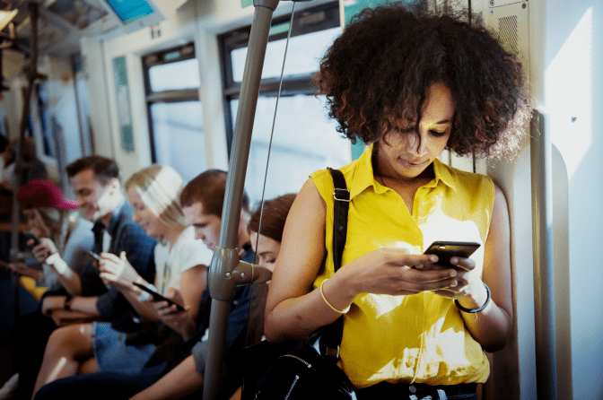 Get Rid of Books, Woman on Subway Looking at Phone