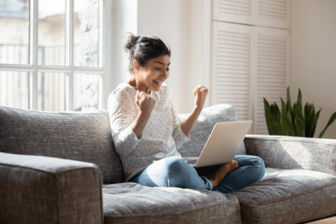 How Do I Stop Shopping Excited Woman on Computer
